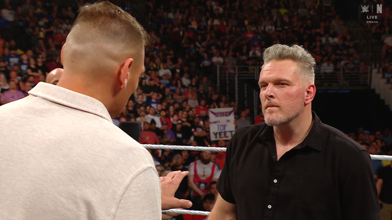 GUNTHER and McAfee talking in the ring