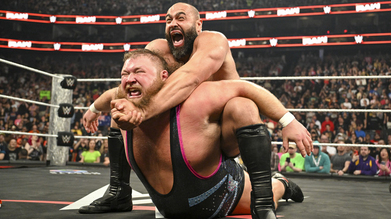 Rusev with The Accolade cinched in on Otis