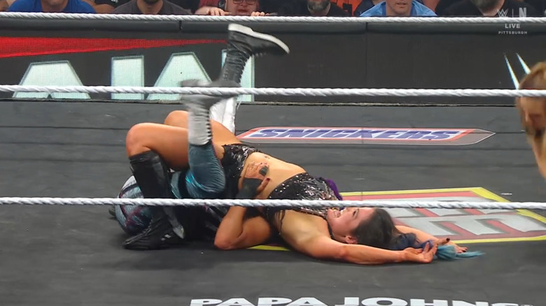 Bayley and Valkyria both with their shoulders down on the mat