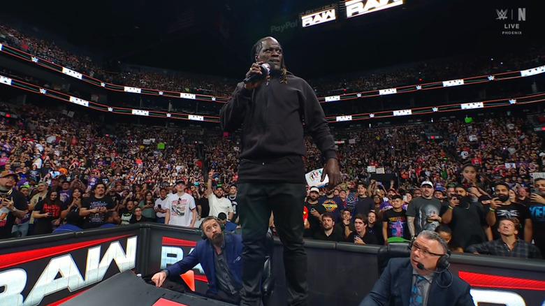 Killings standing on the announce desk
