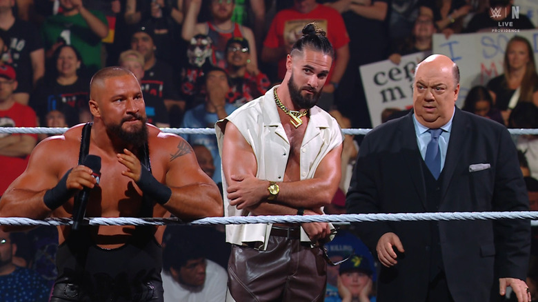 Breakker speaking as Rollins and Heyman eye him