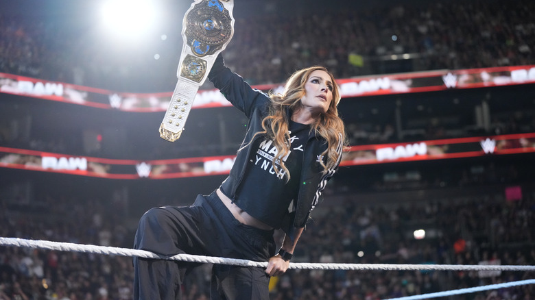 Lynch posing with her Women's Intercontinental Championship