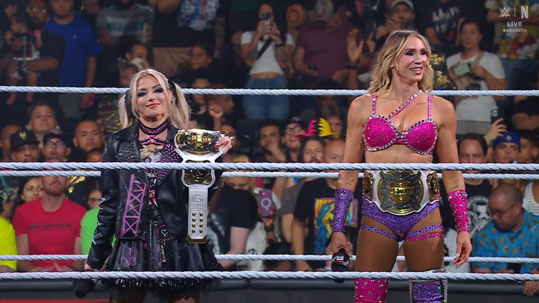Bliss and Flair standing in the ring