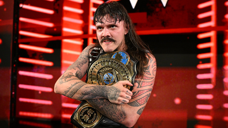 Dominik hugging the Intercontinental Championship
