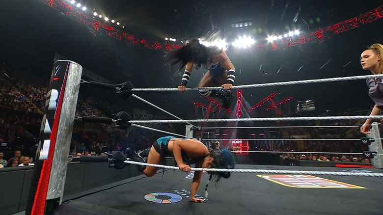 Perez about to land a stomp on Valkyria's back in the corner