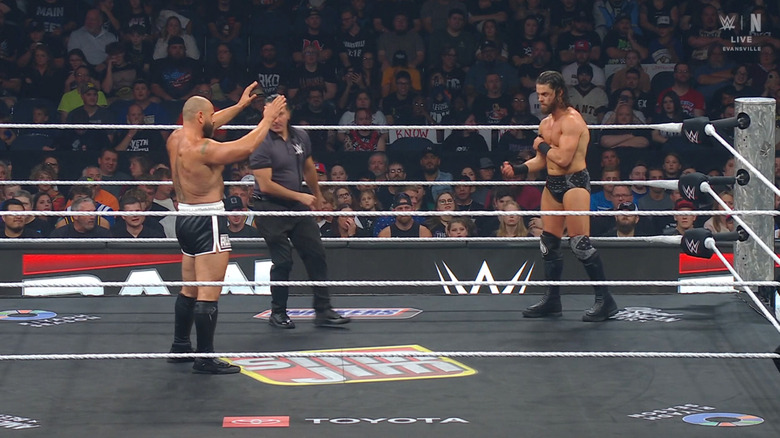 Rusev and McDonagh staring one another down