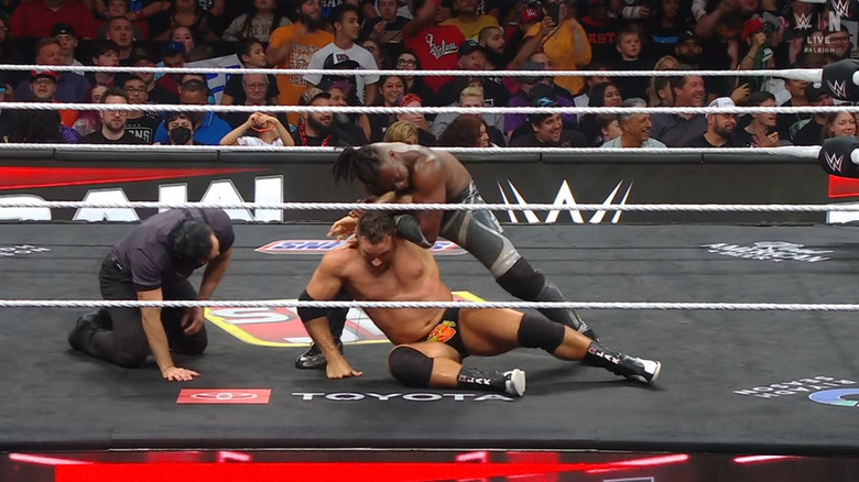 Kingston wearing down Knight with a submission hold