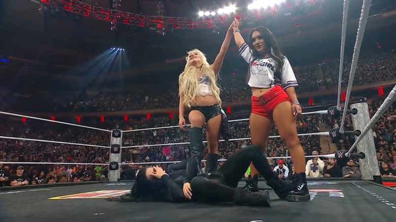 Liv Morgan and Roxanne Perez stand tall over Stephanie Vaquer