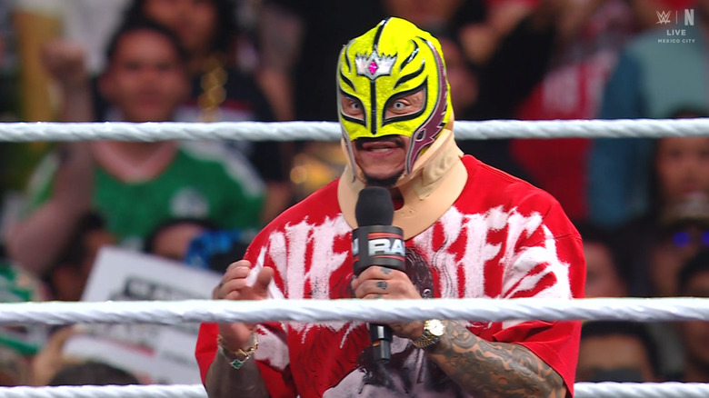 Rey talking inside the ring