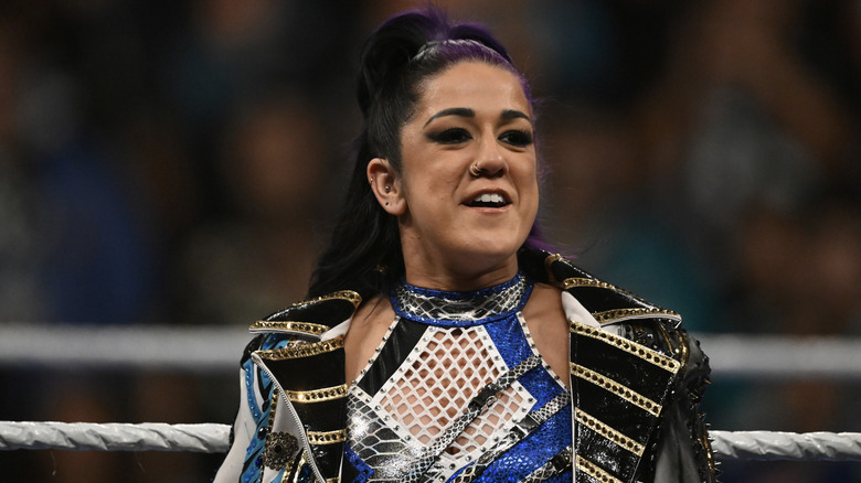 Bayley on the ring apron