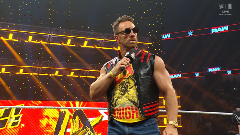 Knight speaking inside the ring