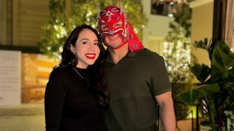 Dragon Lee and his wife, Lupita, pose outside of a restaurant in a photo posted to her Instagram account.