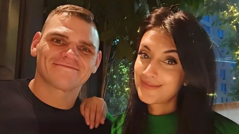GUNTHER and his wife, Jinny, pose for a selfie photo taken at a dinner posted to her Instagram account.