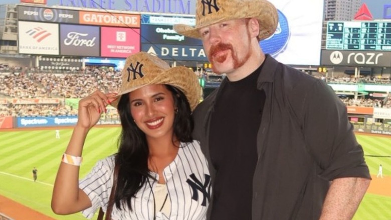 Sheamus and his wife, Isabella, pose in cowboy hats at a New York Yankees game in a photo posted to her Instagram account.