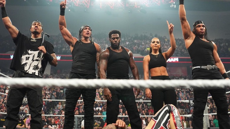 Carmelo Hayes stands alongside Bronco Nima, Royce Keys, Jaida Parker, and Lucien Price after joining the group on the October 12, 2026 edition of 