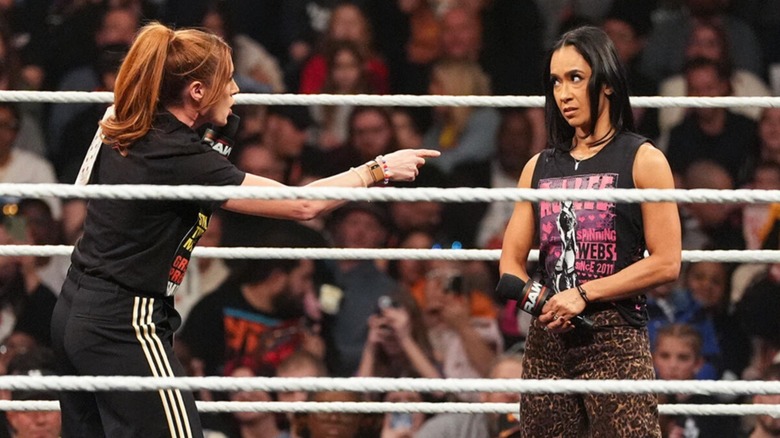 Becky Lynch and AJ Lee arguing