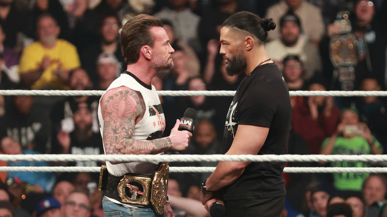 CM Punk and Roman Reigns practicing a segment they'd do several times over the next few months