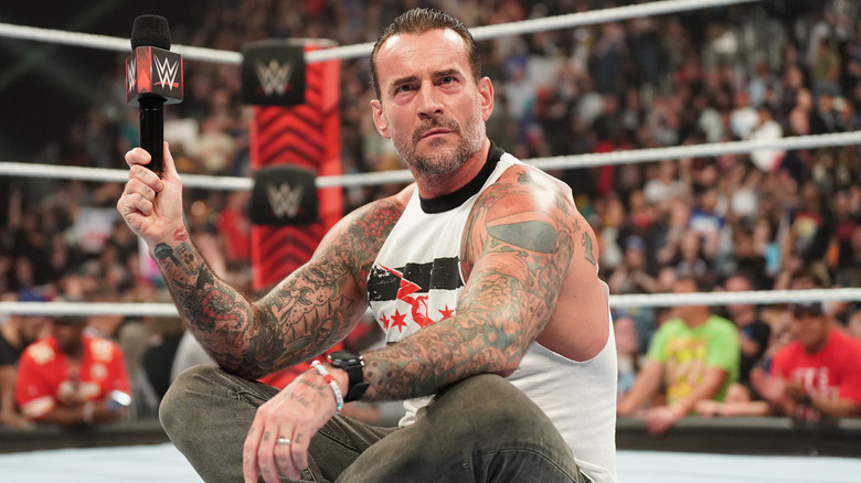 CM Punk sitting in the ring