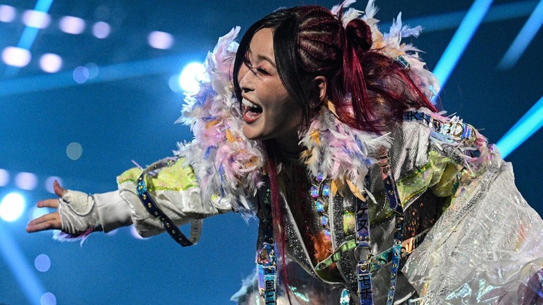IYO SKY poses on the ropes and smiles to the fans before her Queen of the Ring tournament four-way match on the June 15, 2026 edition of 