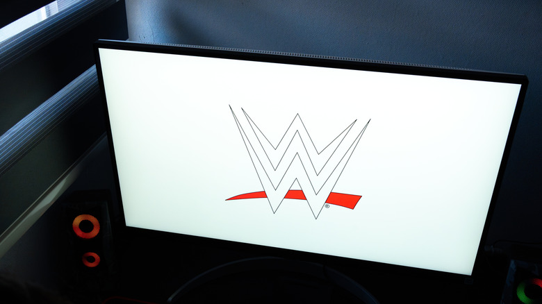 A Shutterstock photo of WWE's logo shown on a computer screen