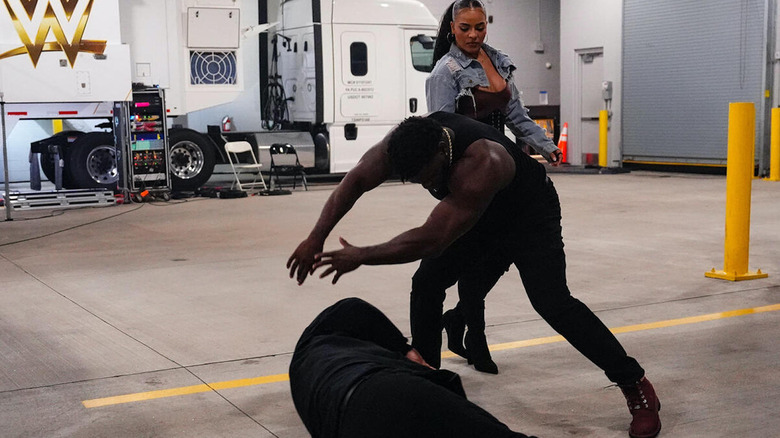 Jaida Parker, Royce Keys standing over Jacob Fatu
