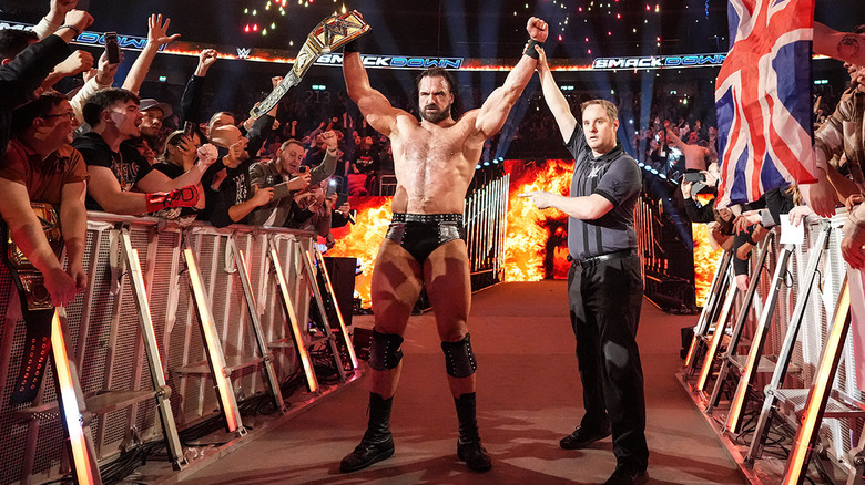 Drew McIntyre celebrating his WWE Championship win