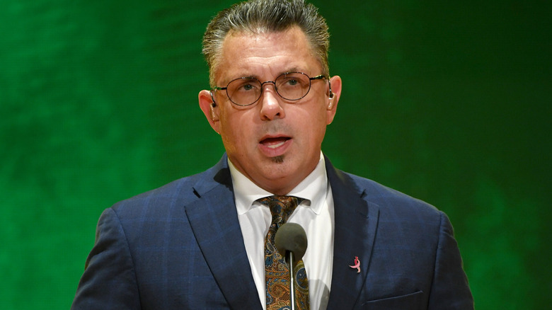 Michael Cole wearing glasses
