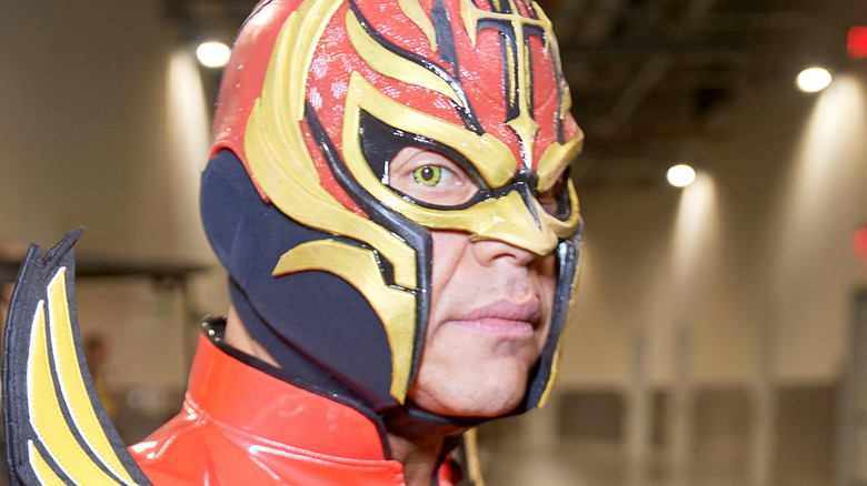 Rey Mysterio looking over shoulder