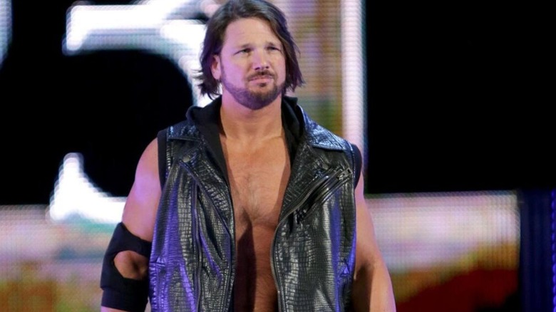 AJ Styles smirks as he heads down to the ring to enter the Royal Rumble match in the third spot.