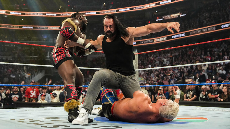 Drew McIntyre fights off Oba Femi while attacking Cody Rhodes at WWE SNME