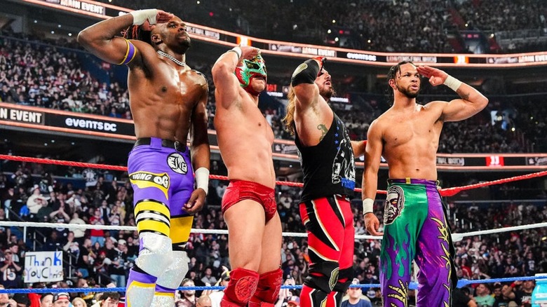 Je'Von Evans, Dragon Lee, AJ Styles, and Leon Slater slat