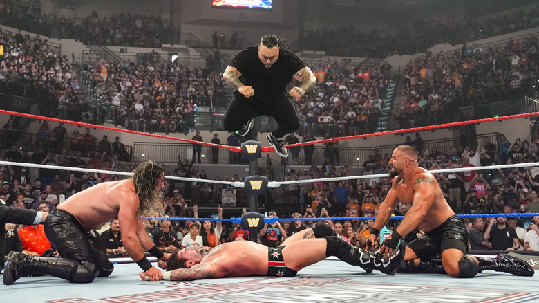 Bronson Reed delivering a Tsunami to CM Punk with Seth Rollins and Bron Breakker during Saturday Night's Main Event at Yuengling Center on May 24, 2025 in Tampa, Florida.