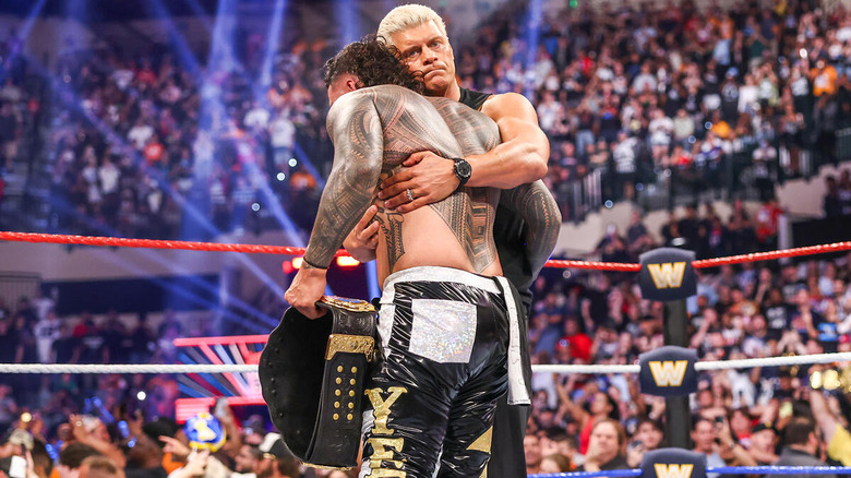 Cody Rhodes hugs Jey Uso