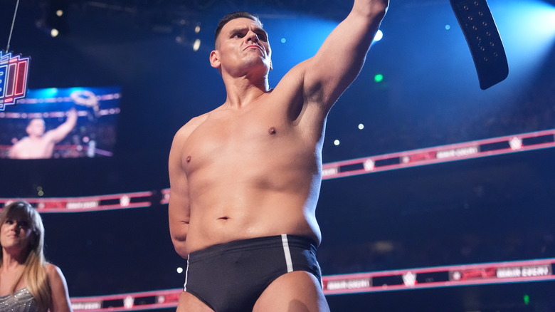 GUNTHER holds up the World Heavyweight title