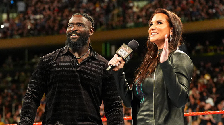 Stephanie McMahon and Oba Femi smile