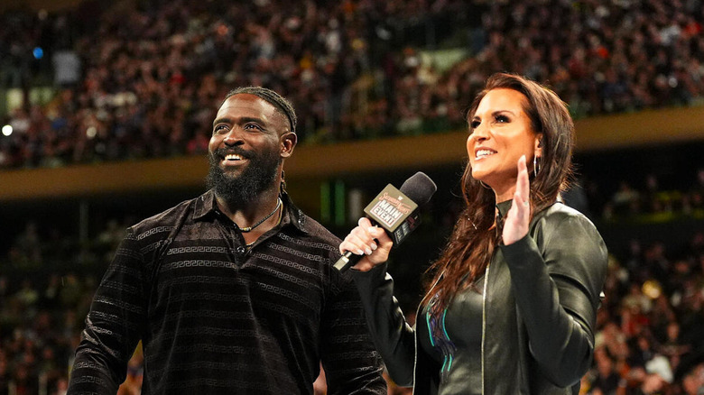 Stephanie McMahon smiles with Oba Femi