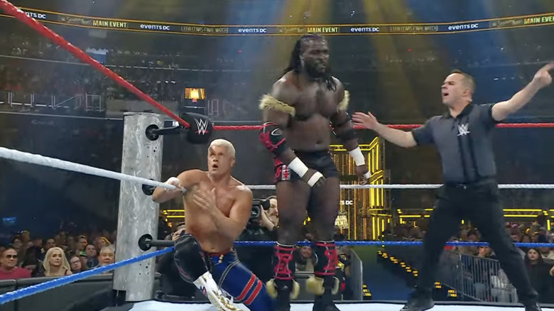 Rhodes and Femi in the corner of the ring