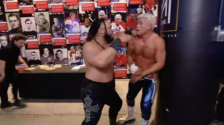 Fatu and Rhodes brawling in the concession area