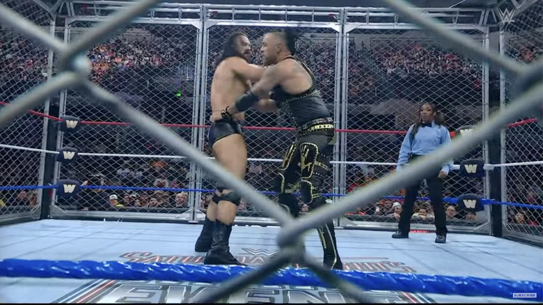 McIntyre and Priest inside the cage