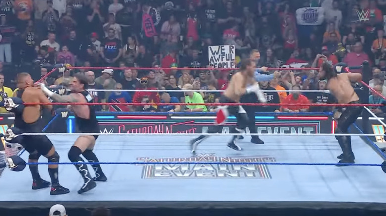 The four men brawling in the ring