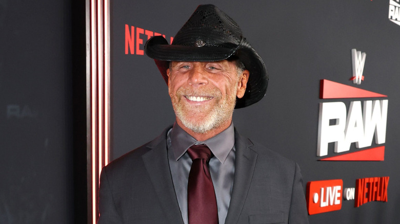 Shawn Michaels smiling with a cowboy hat on
