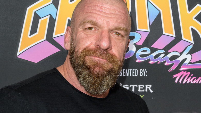 Triple H in casual close at a media event