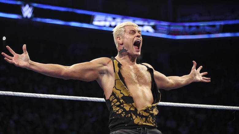 Cody Rhodes poses in a ripped shirt in the ring on "WWE SmackDown"