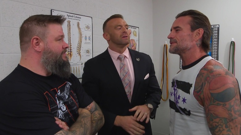 Kevin Owens, Nick Aldis, and CM Punk backstage on "WWE SmackDown"