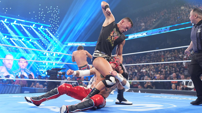 Ricky Saints delivers punches to Rey Fenix in the ring on "WWE SmackDown"