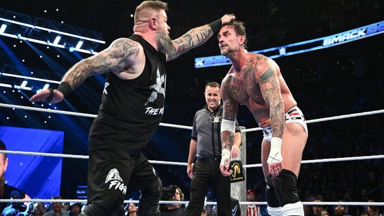 Kevin Owens looks to hit CM Punk in the middle of the ring during a match on the August 21, 2026 edition of "WWE SmackDown."