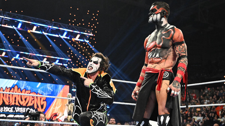 Danhausen poses beside Finn Balor in the ring on "WWE SmackDown"