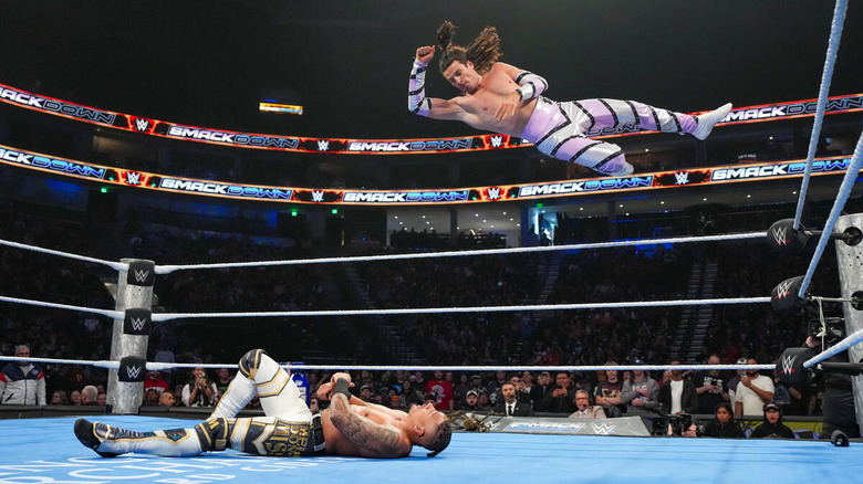 Kit Wilson hitting a elbow drop on Carmelo Hayes on "WWE SmackDown"