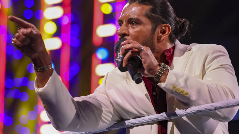Santos Escobar with a microphone