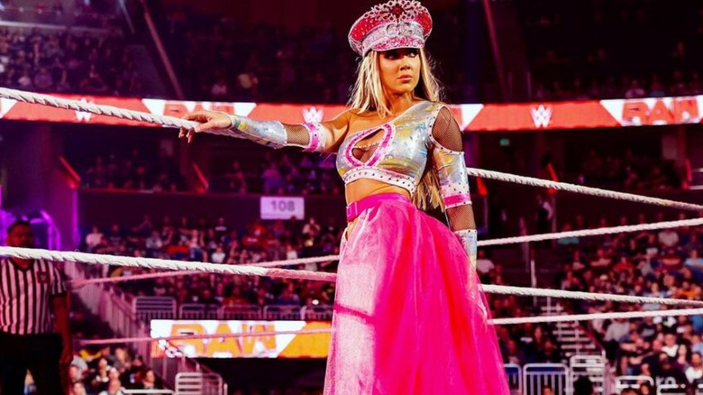 Chelsea Green poses on the apron before a match on "WWE Raw."